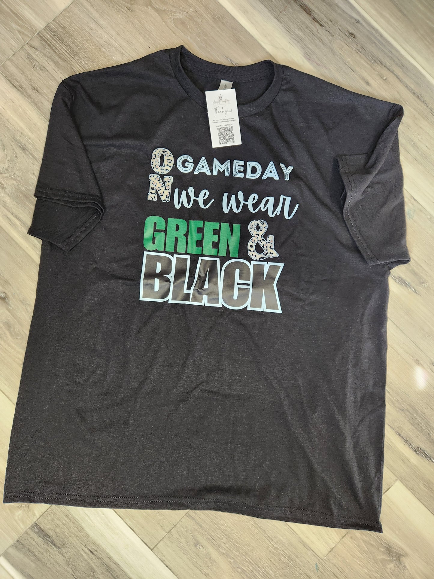 On game day we wear green and black